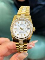 Rolex Datejust 31mm 18K Gold Bracelet White MOP Dial Lady Baguette Watch